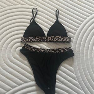 Brand new 2 piece Bikini. Black with animal print